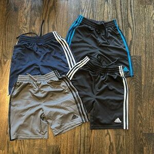 Boys, Adidas, short size medium 10/12. Four pairs multicolors.